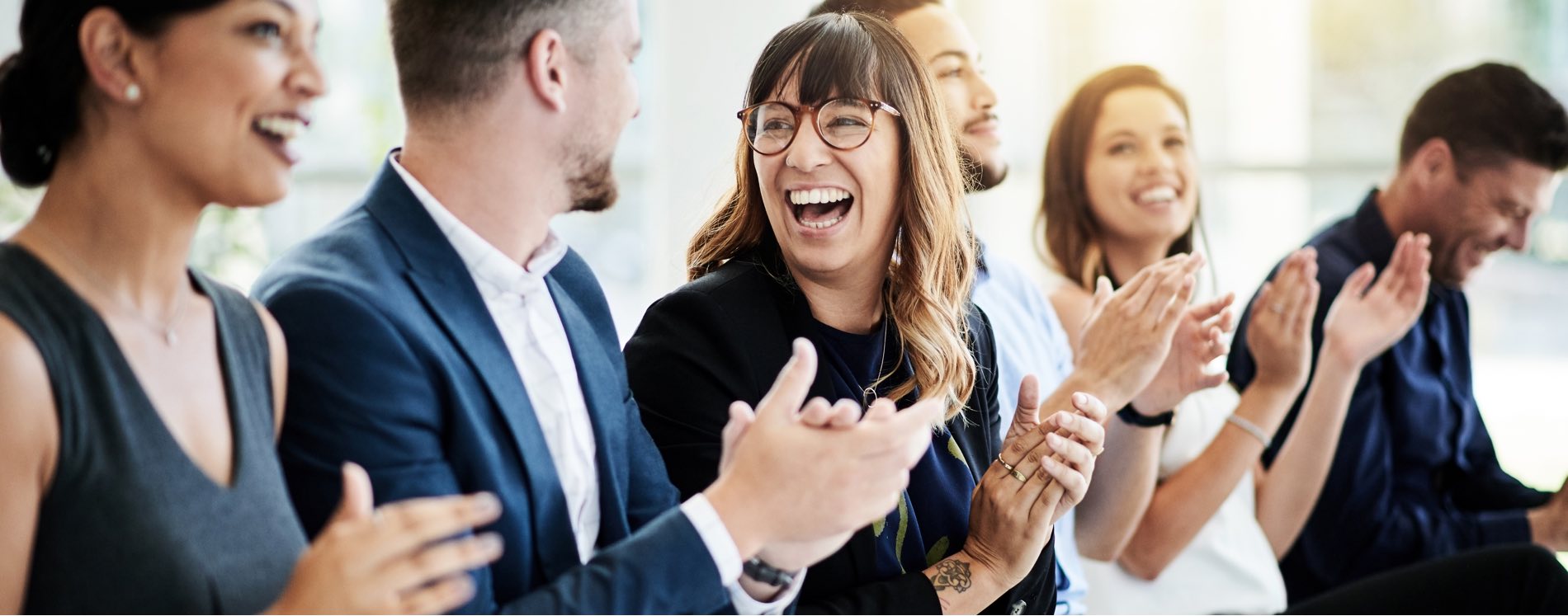 business team clapping