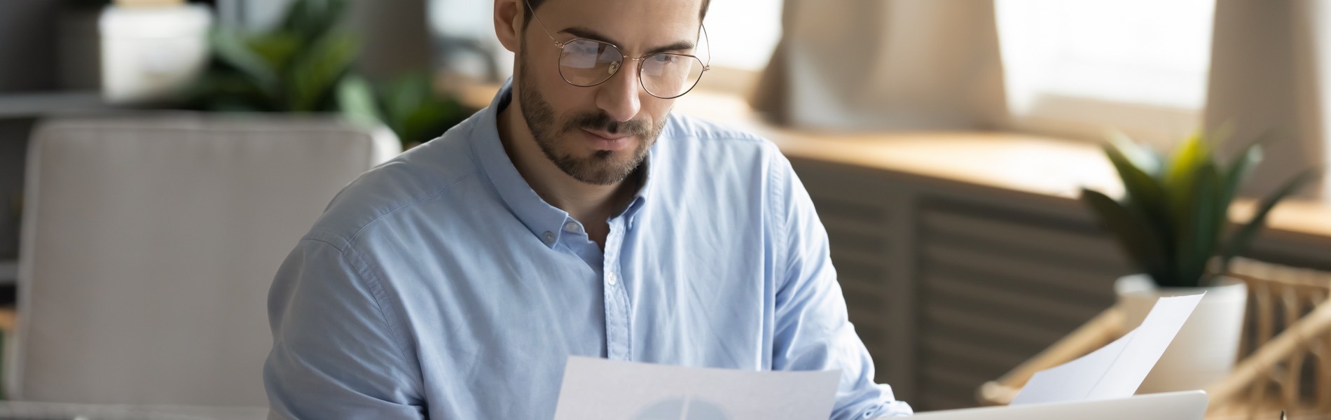 man studying commercial bill