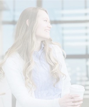 woman smiling with coffee